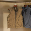 Men's thin nylon vest cardigan in army green with side pockets and straight retro cut.