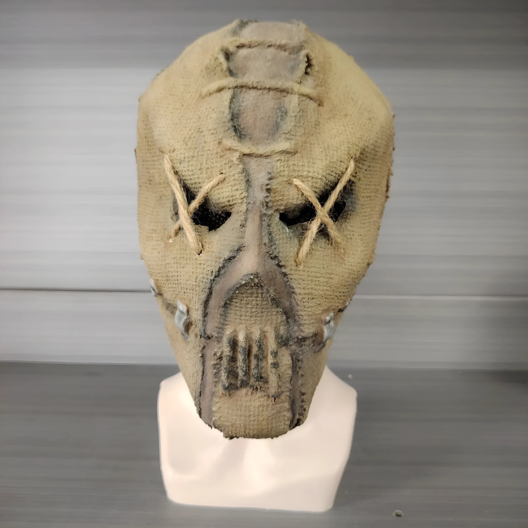 Latex Halloween mask with detailed scar skull design shown from front, suitable for adult wear