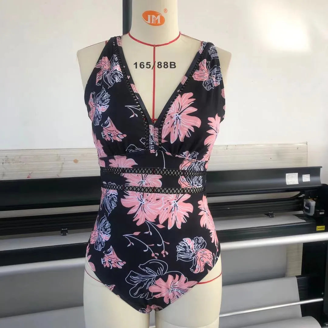 Black printed plus size polyester mesh bikini swimsuit for women on a size chart.
