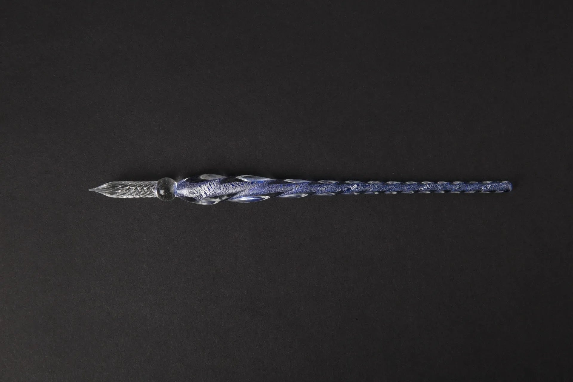 Transparent coloured glass crystal pen with water art ink in gift box, shown in multiple colour options.