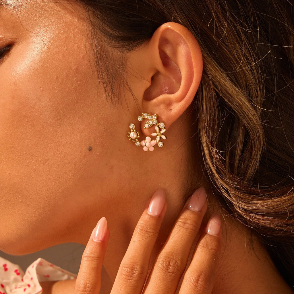 Flower-shaped stud earrings with colourful oil accents and petal elements on 18K gold electroplated stainless steel