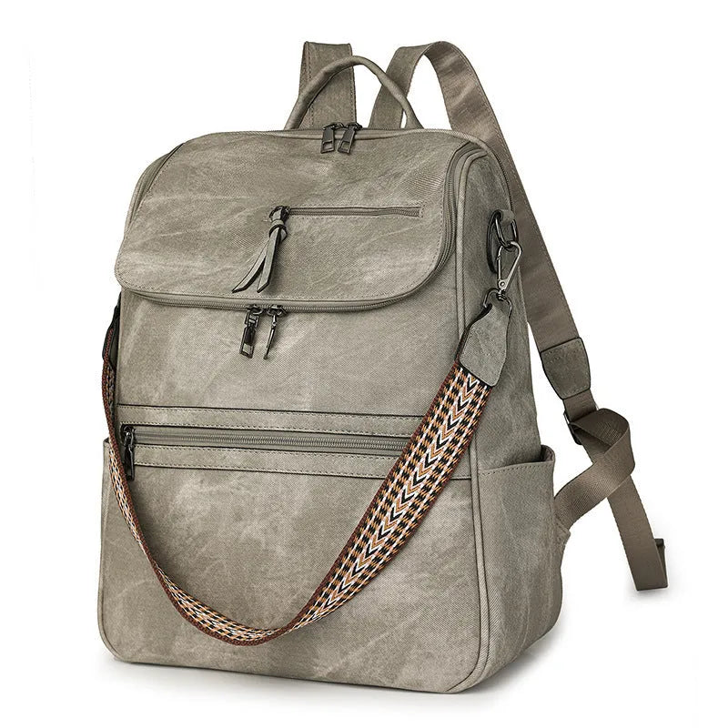 Retro style PU leather college backpack with curved shoulder straps, shown in one of six colour options.