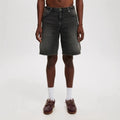 Men's light blue loose fit straight leg cotton denim jeans on a neutral background.