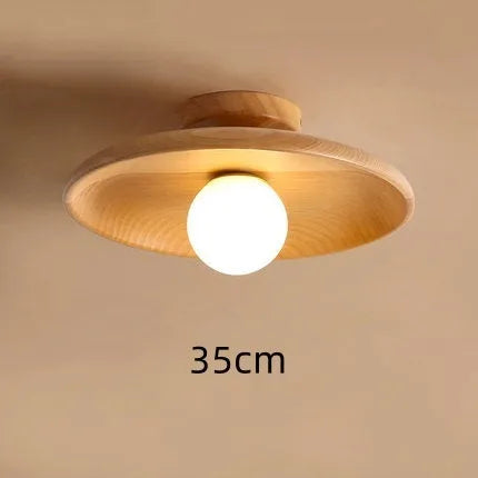 Modern solid wood and glass ceiling lamp in walnut colour showing three size options.