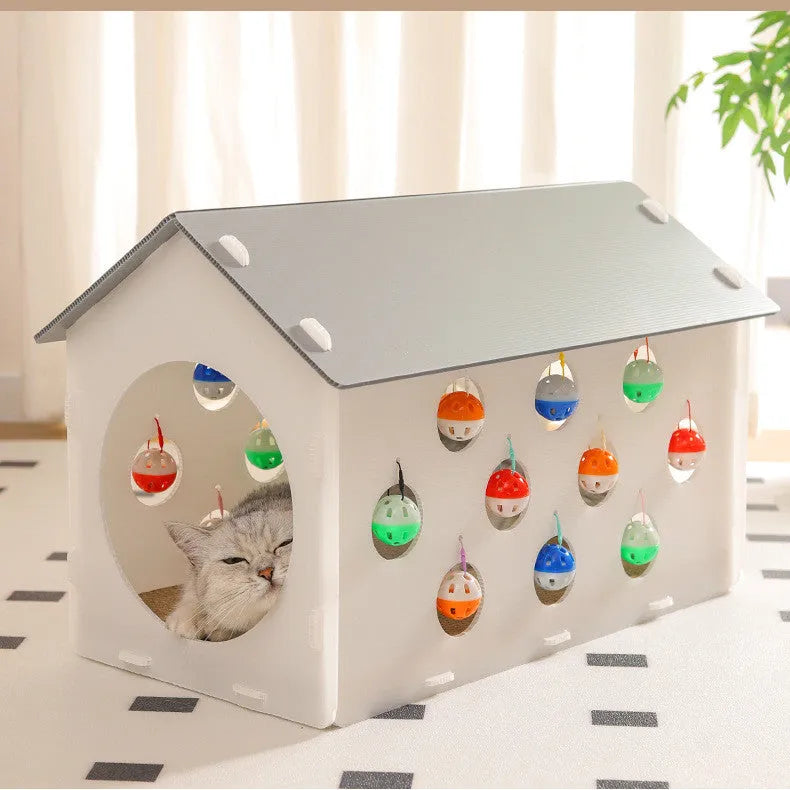 Plastic cat scratch board toy with integrated cat nest bed and tunnel, featuring a bell ball.