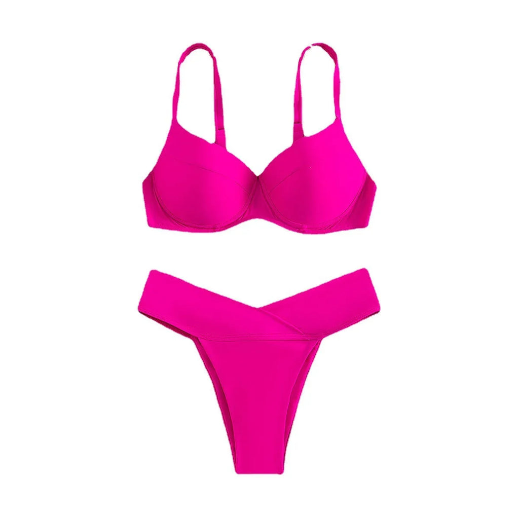 Women's solid colour nylon bikini swimsuit in a briefs style, shown in a fluorescent pink colour.