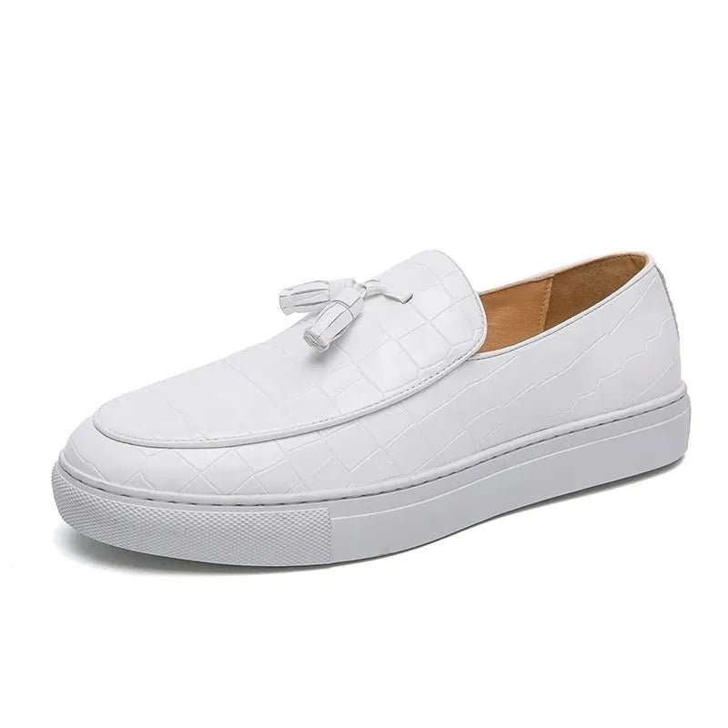 Men's black casual sneakers with a tassel detail on the artificial PU upper and a round toe.