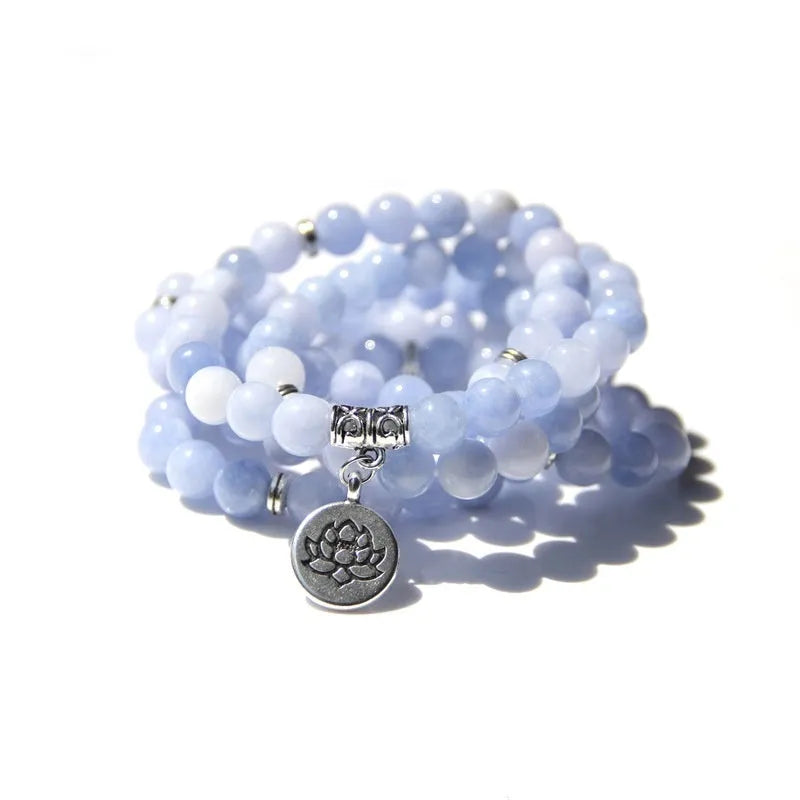 Women's vintage-style bracelet with a natural stone angel echeveria lotus pendant on a chain.