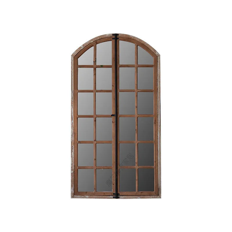 Terrace distressed wooden frame fake window wall mirror in log colour hanging on a wall.