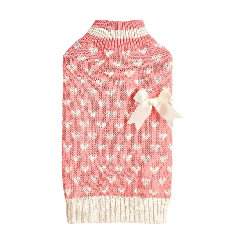 Red love heart motif dog sweater on small dog with bow decoration