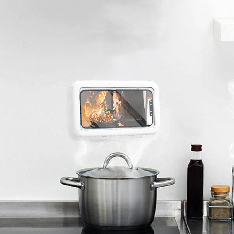 White waterproof phone holder mounted on bathroom tile with phone inside showing touch screen access