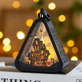 Portable Halloween pumpkin lamp decoration in four colours measuring 8.9 by 5.2 by 11.5 centimetres