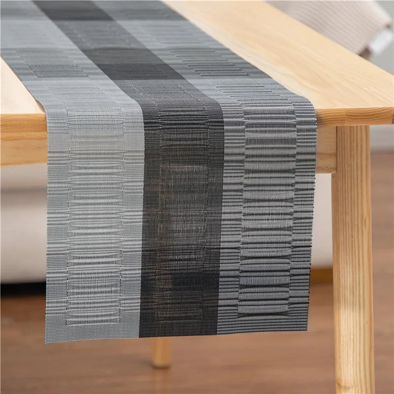 Modern PVC non-slip placemat in gradient bamboo colour on a table.