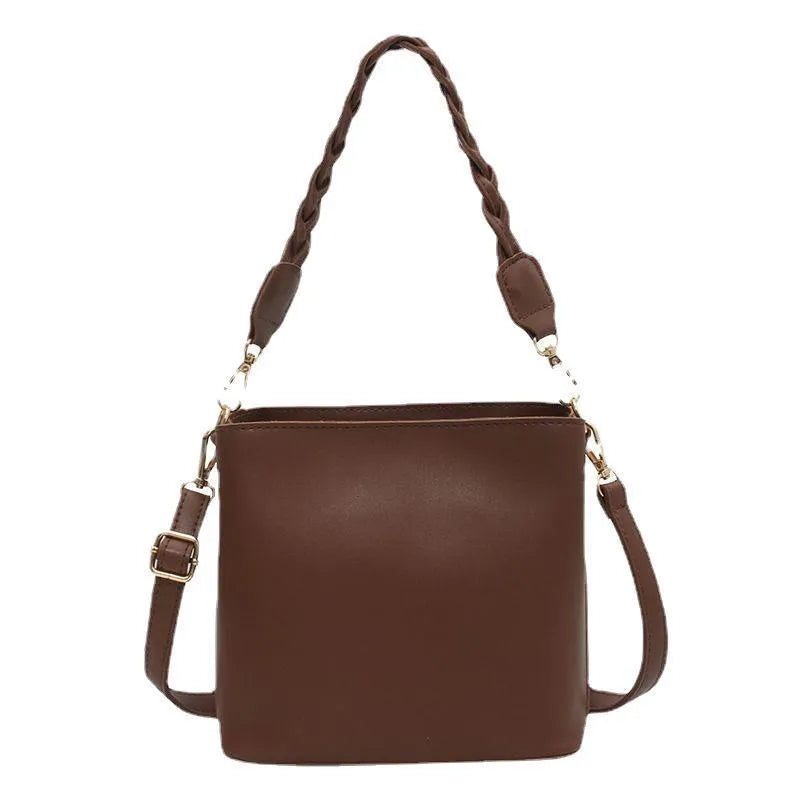 Retro woven PU leather unisex crossbody bucket bag in khaki colour.