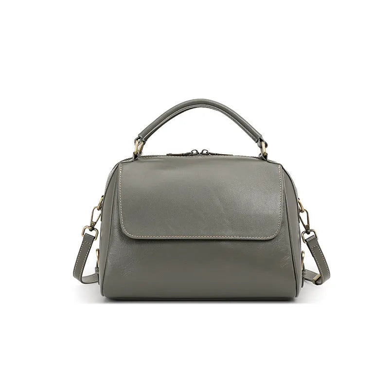 Genuine leather crossbody tote bag in a cross square shape with double straps and internal organiser pockets.
