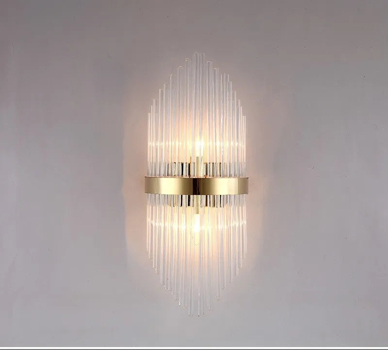 Modern crystal wall lamp with petal design in titanium gold finish