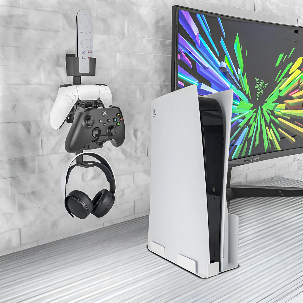White wall-mounted hook holding PS5 controller and gaming headset