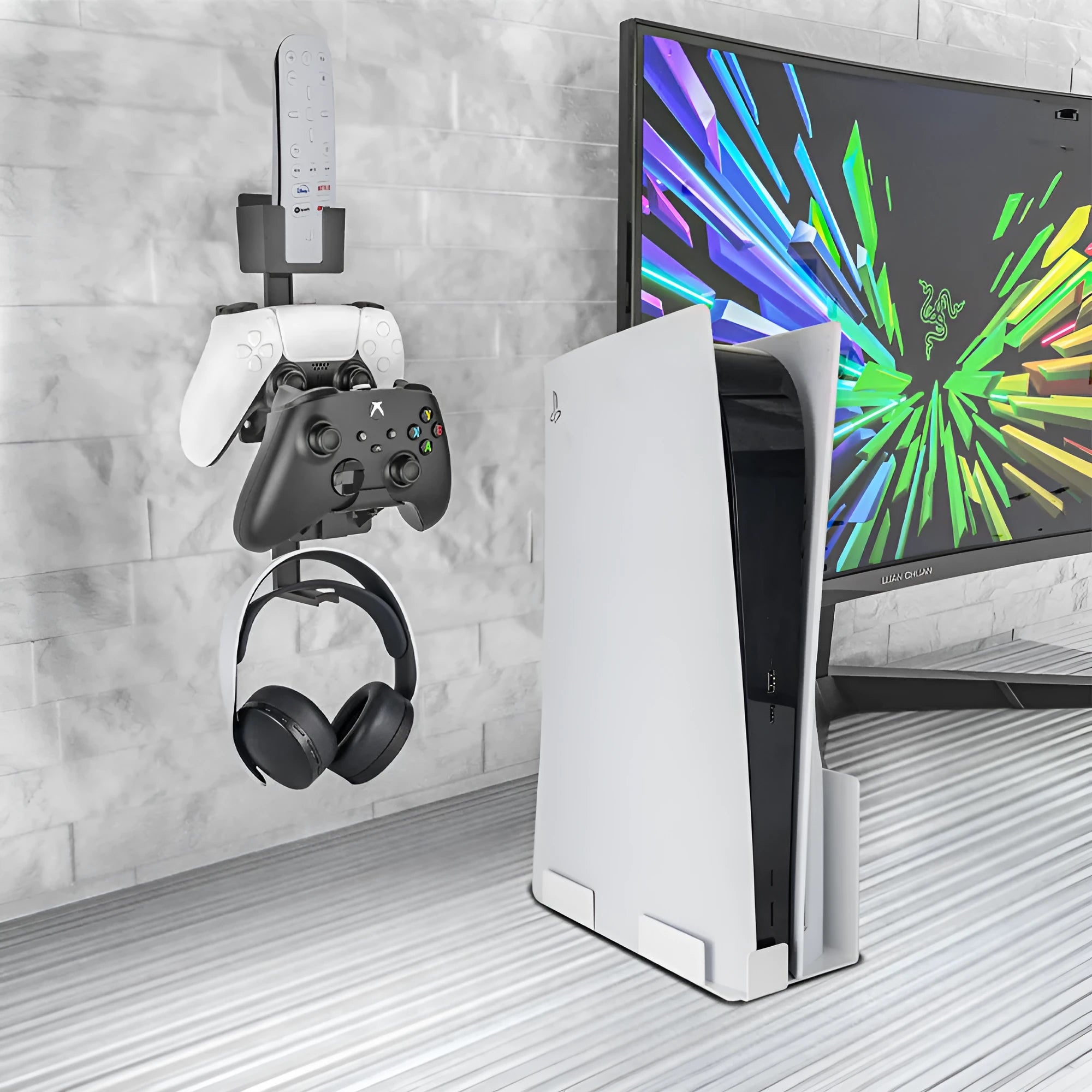 White wall-mounted hook holding PS5 controller and gaming headset