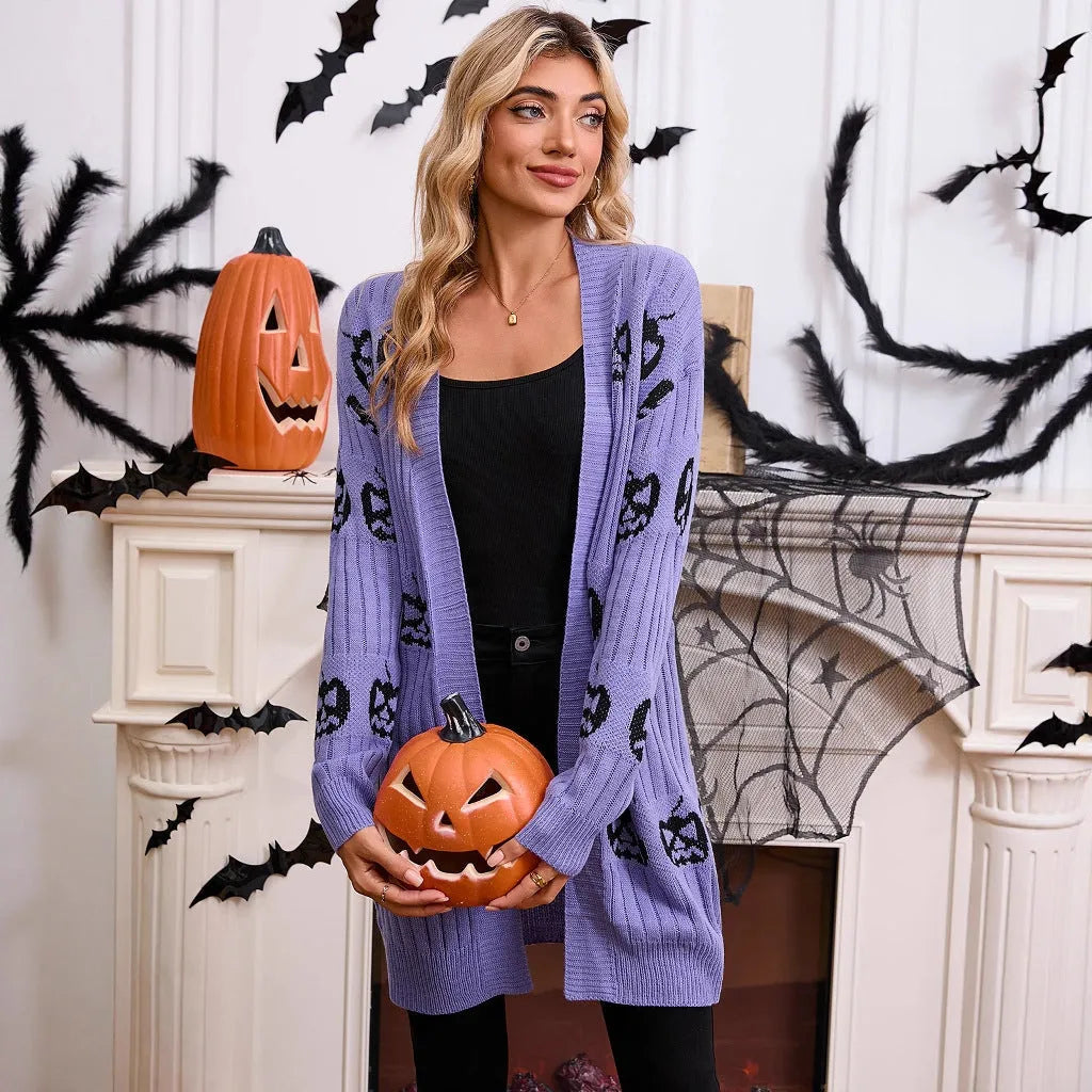 Women's black knitted cardigan with an orange pumpkin head jacquard pattern and regular sleeves.