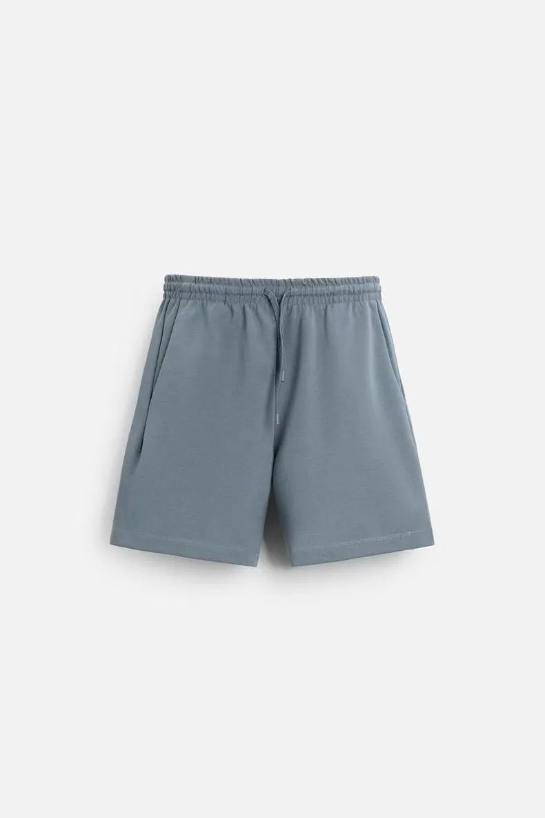 Short sleeve top and matching shorts set with double-sided cloth texture in urban style