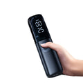 Black portable electric car air pump with tyre pressure gauge and plug-in cord