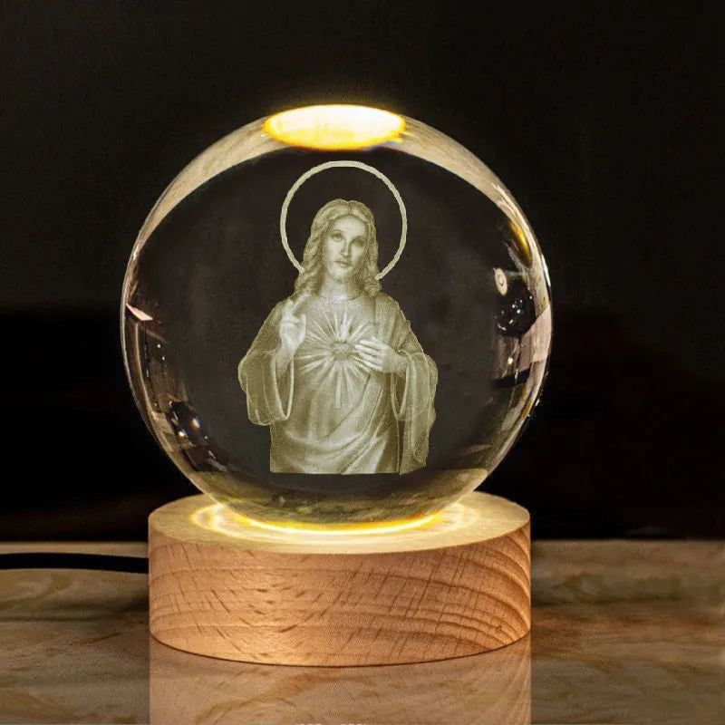 White crystal lamp with 6cm diameter orb on solid wood warm light base showing religious ornamentation