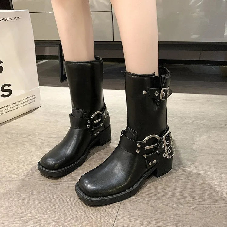 Black platform boot with buckle strap on mid-calf shaft, displayed next to brown version.