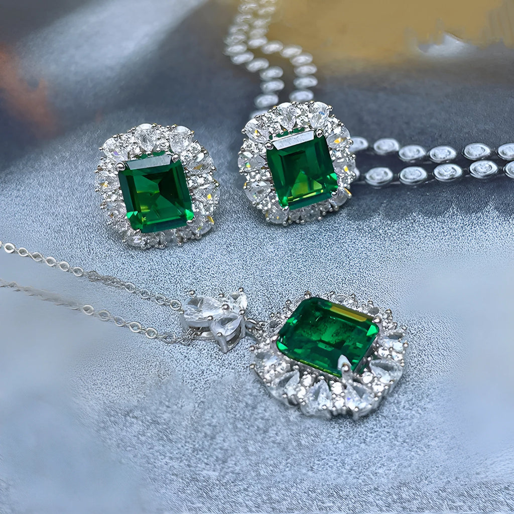 French royal style copper jewellery set with botanical engravings showing necklace, earrings, and ring