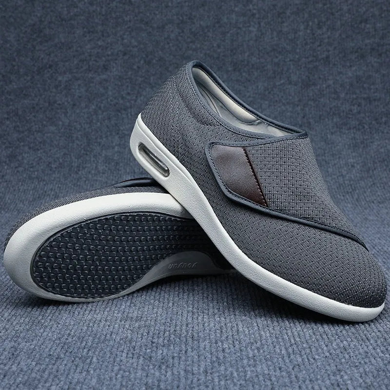 Casual beige slip-on shoes with a round toe and rubber sole for men and women.