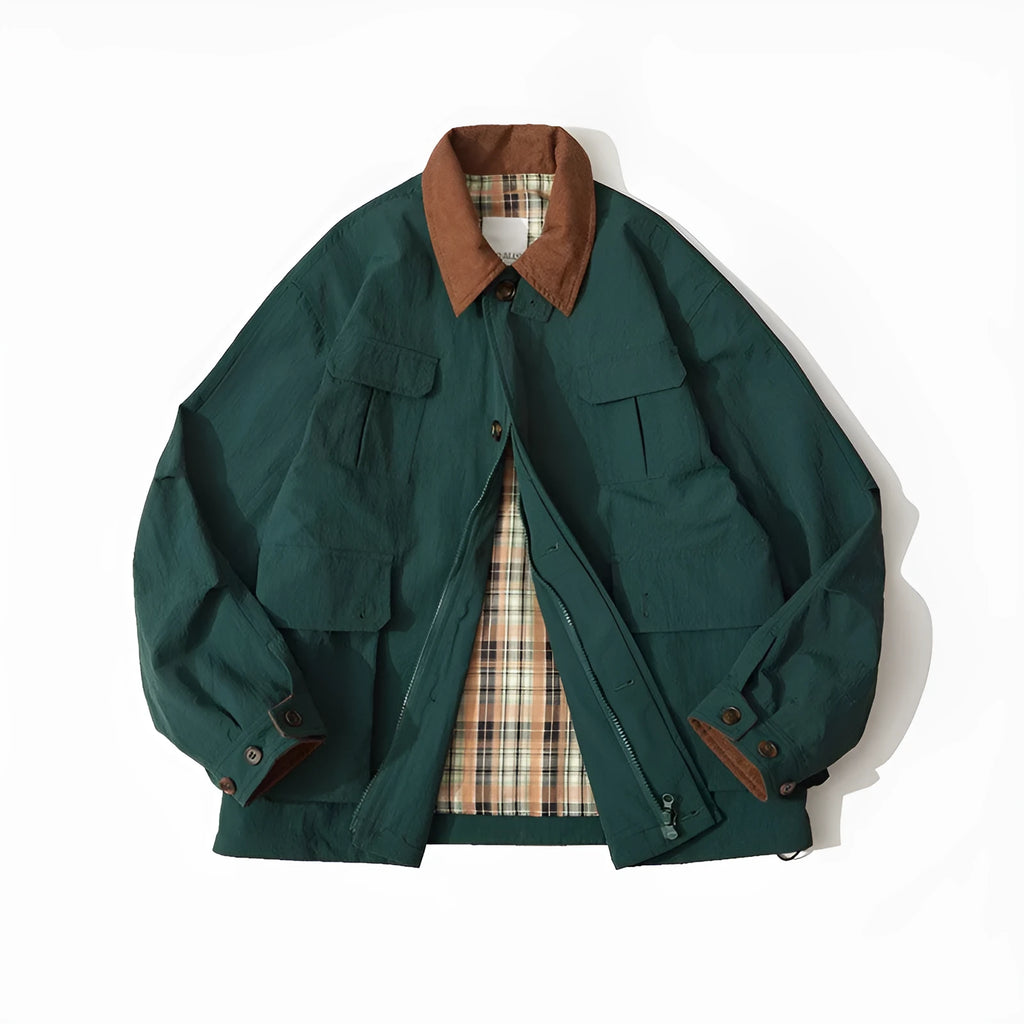 Green unisex casual jacket with contrast colour panels and side seam pockets on a model.