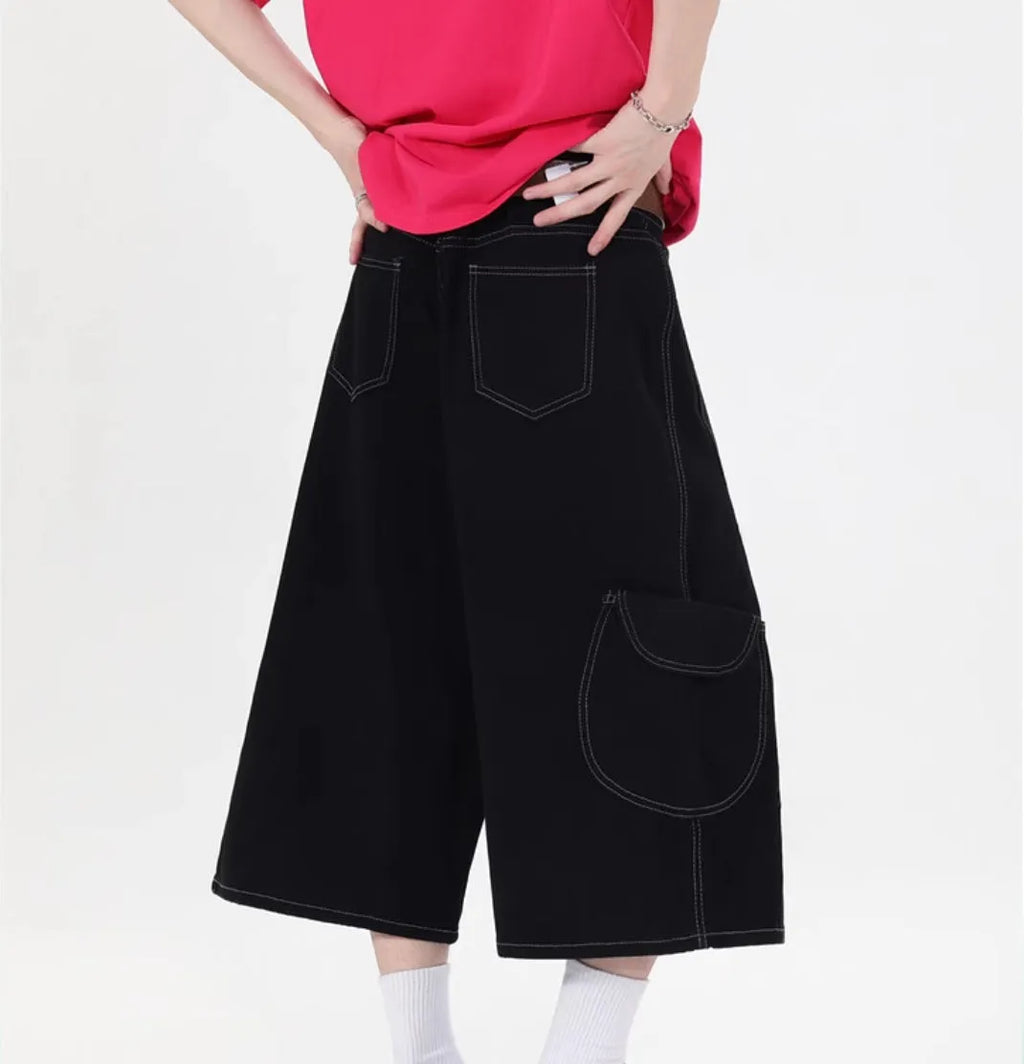 Retro denim workwear shorts with multiple pockets and wide leg trousers styling in black or red