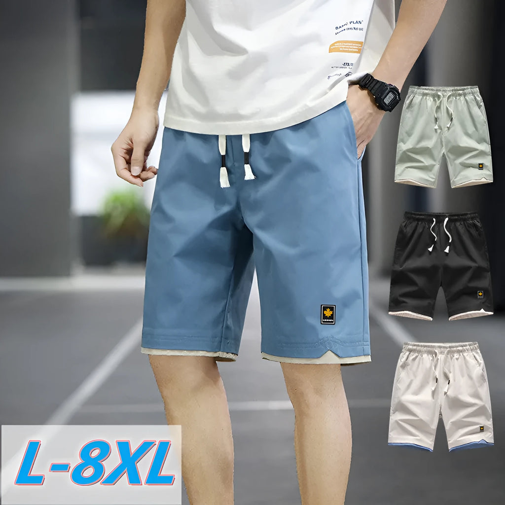 Men's loose fit straight leg beach shorts in various colours with elastic waistband