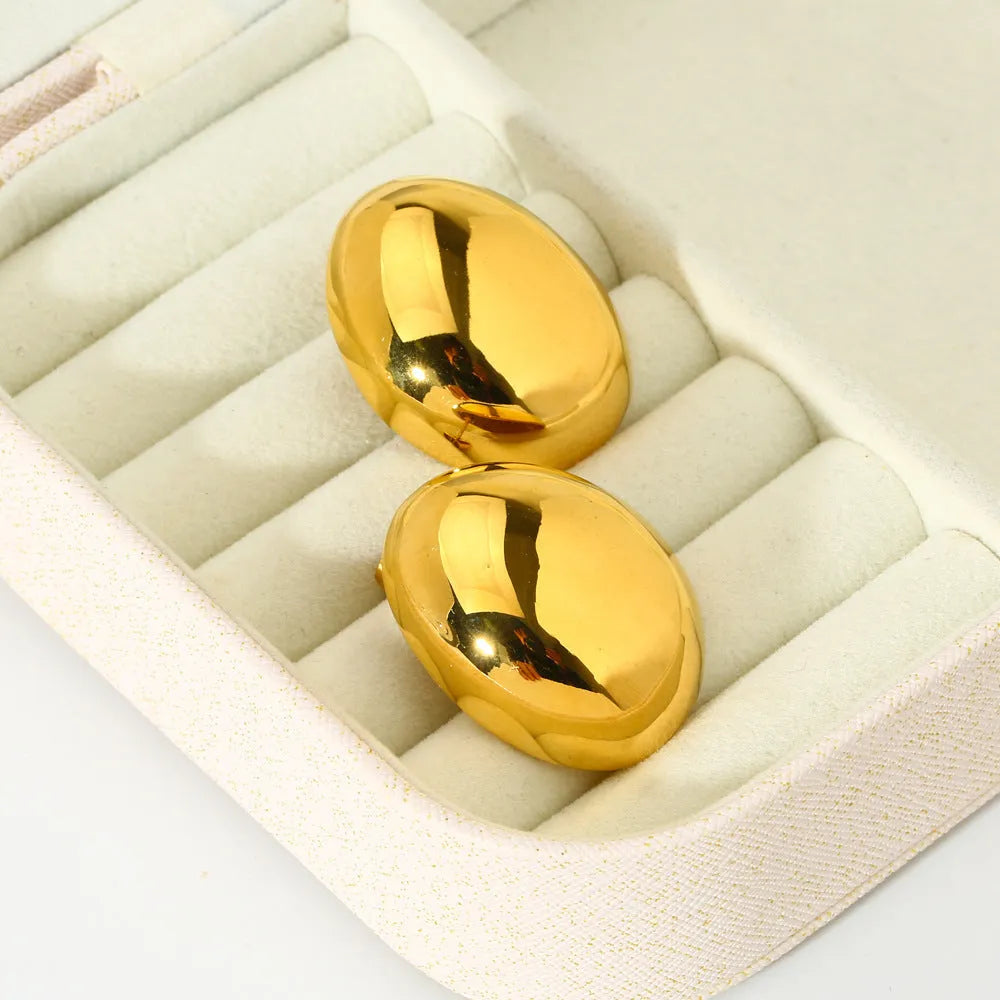 Geometric stainless steel ear studs with glazed 18K gold electroplated surface in DFE139 colour