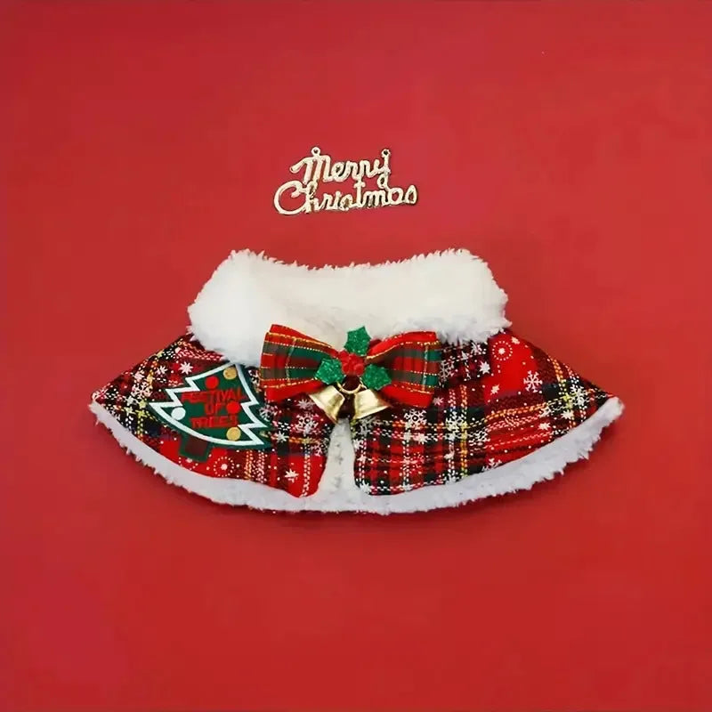 Red pet Christmas scarf with a jingle bell on a dog, showing the polyester fabric and festive design.