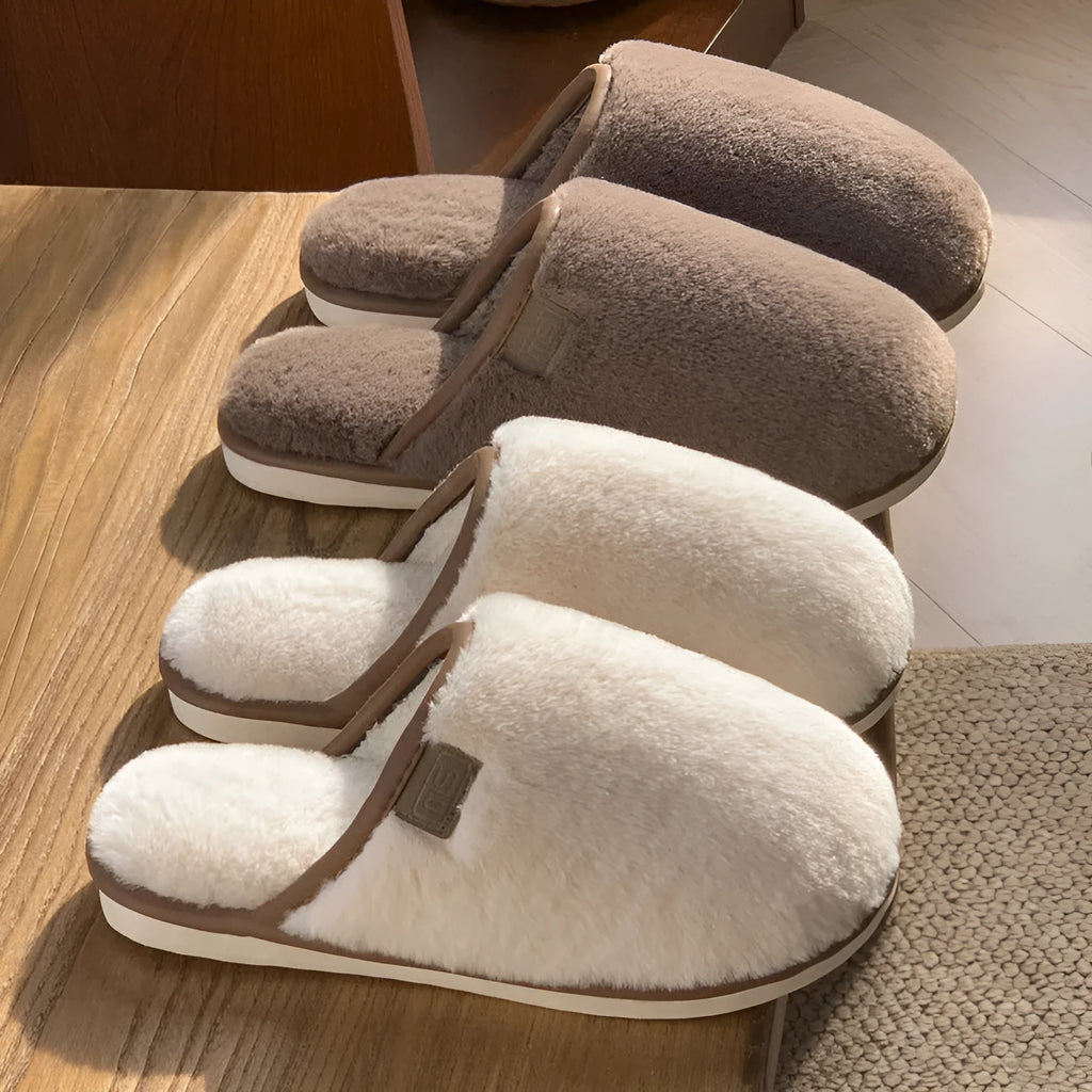 PVC non-slip winter slipper in a solid colour on a wooden floor.