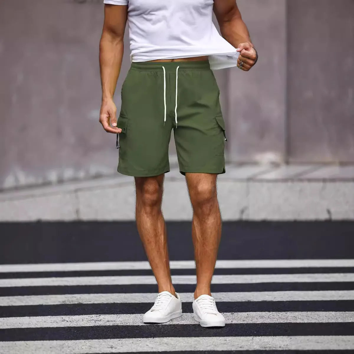 Men's loose fit work shorts in fluorescent green or army green colours with straight leg design