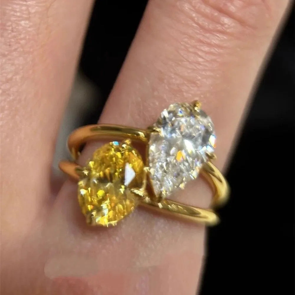 Women's geometric open ring with water drop design and double colour zircon stones on copper base