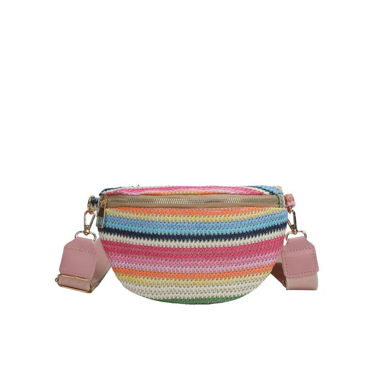 Women's woven straw beach bag with shell shape and single shoulder strap in pink colour