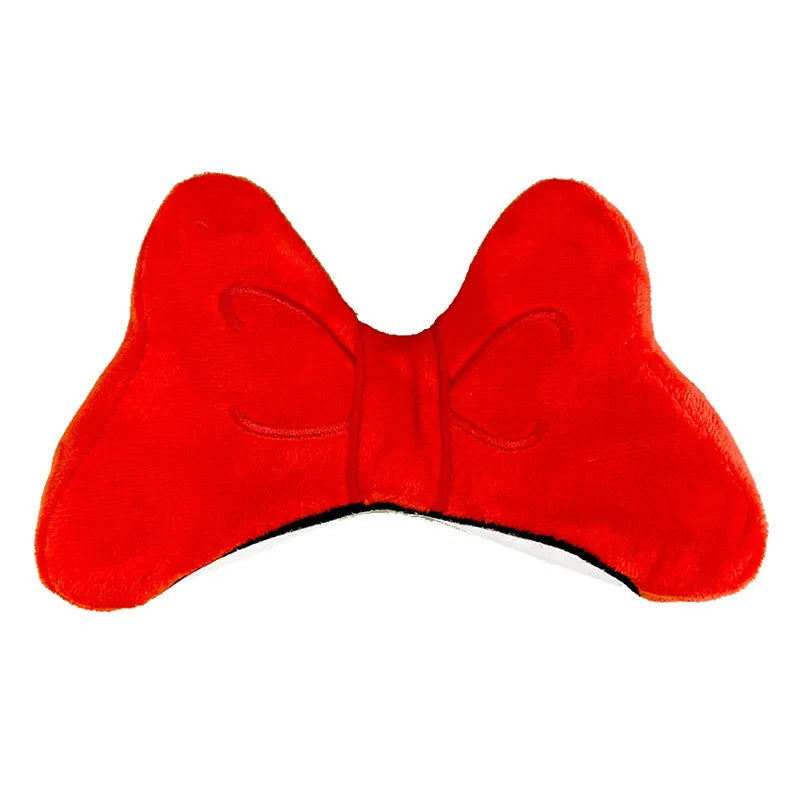 Plush bow tie helmet decoration for motorcycle and ski helmets in red, peach pink, and rose pink colours.
