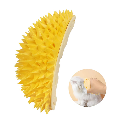Yellow durian-shaped cat corner scratcher with textured surface and packet of cat mint powder