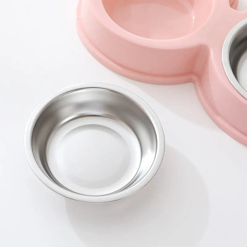 Stainless steel pet bowl with frog design and two compartments for food and water