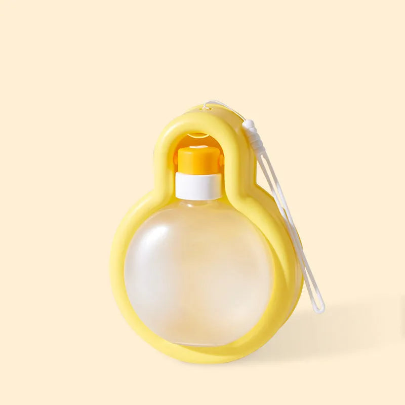 Green Orange Yellow portable pet travel cup with integrated drinking bowl and handle, showing 500ml and 350ml size options.