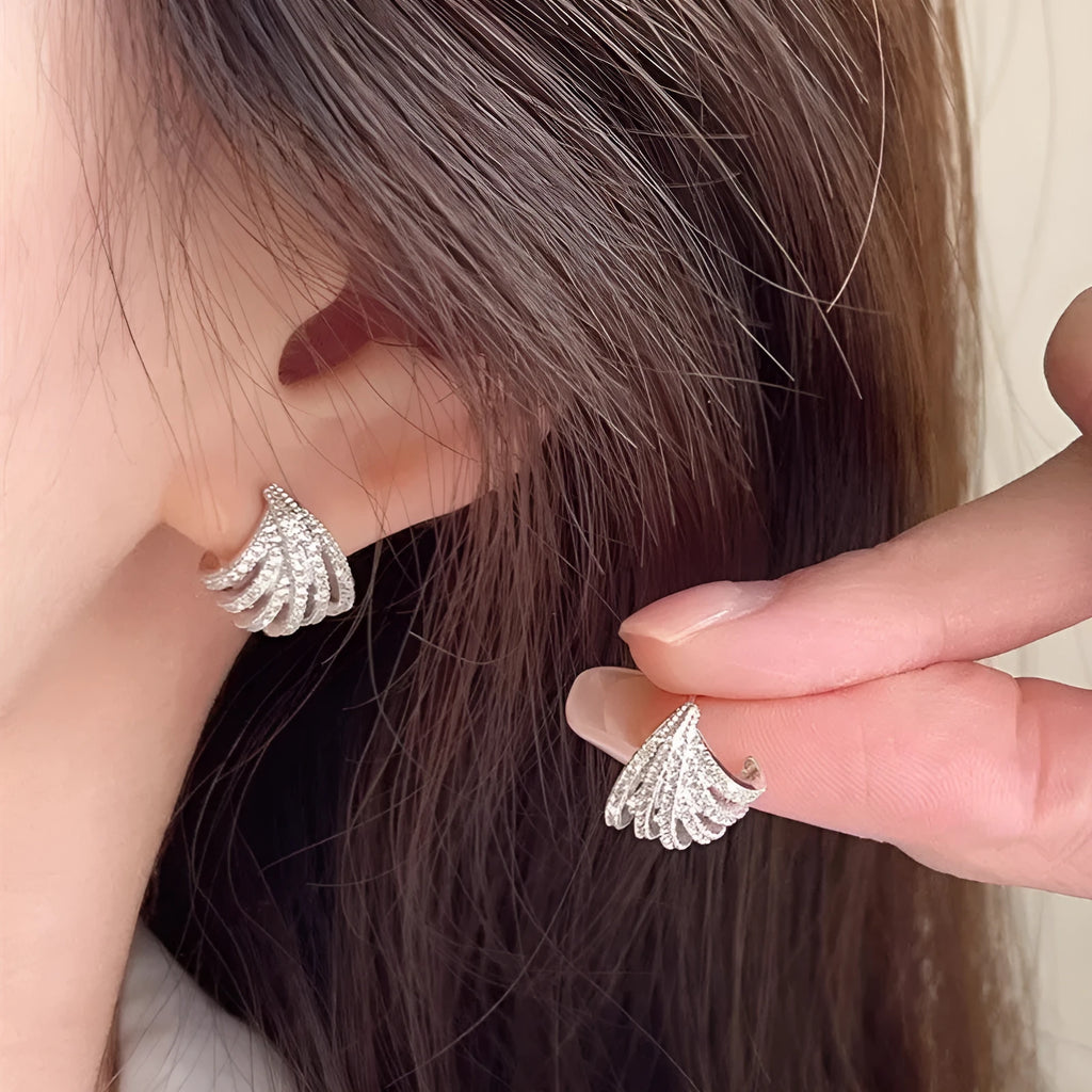 Women's geometric line design earrings with zircon detailing and platinum electroplated finish