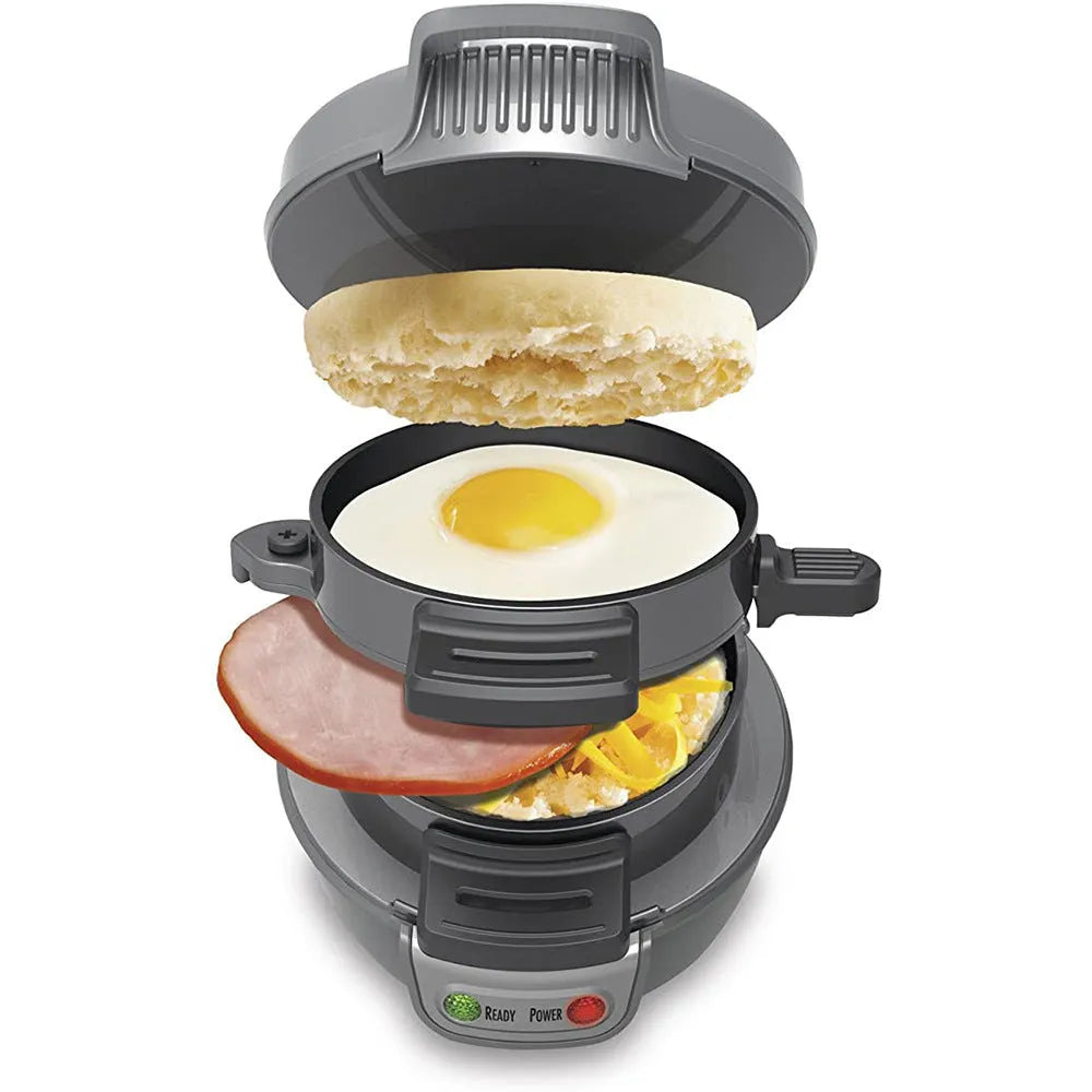 Bright red multifunctional breakfast machine with sandwich plates, waffle grid, and egg cooker ring on a kitchen counter.