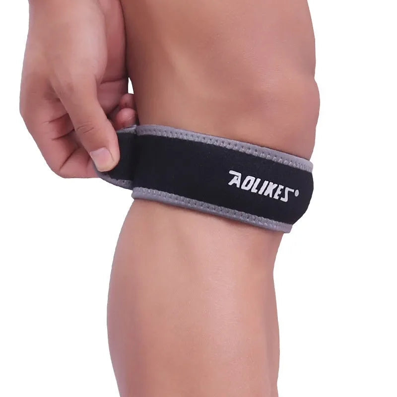 Black and grey patella retinaculum knee support for sports protection