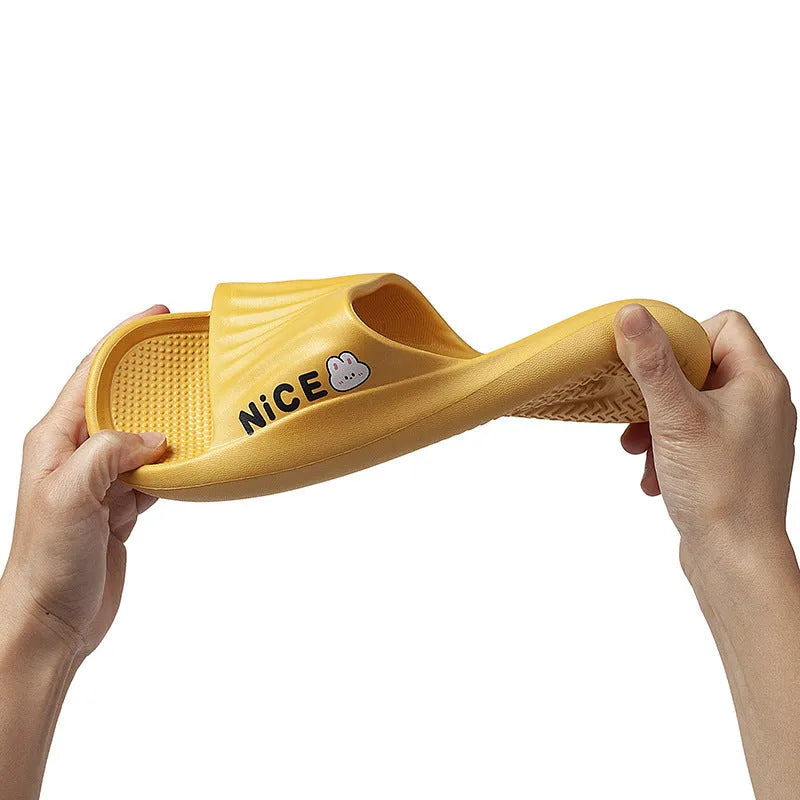 Pair of minimalist EVA flip flop slippers in a choice of six colours, showing the injection moulded non-slip sole.