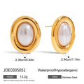 A pair of stainless steel stud earrings for women featuring a single vintage pearl, with butterfly clutch backings visible.