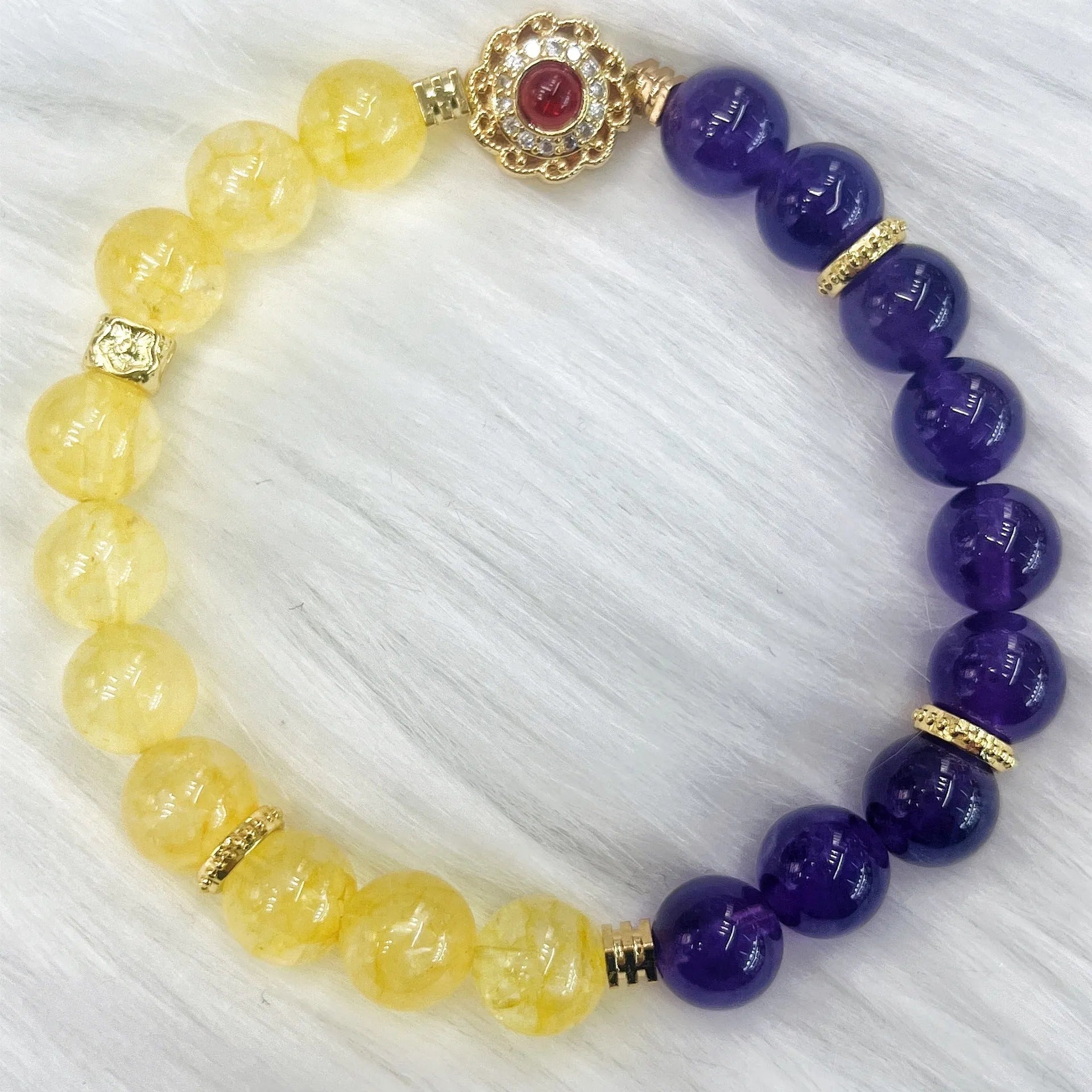 Handmade women's amethyst crystal bracelet with yellow and purple stones