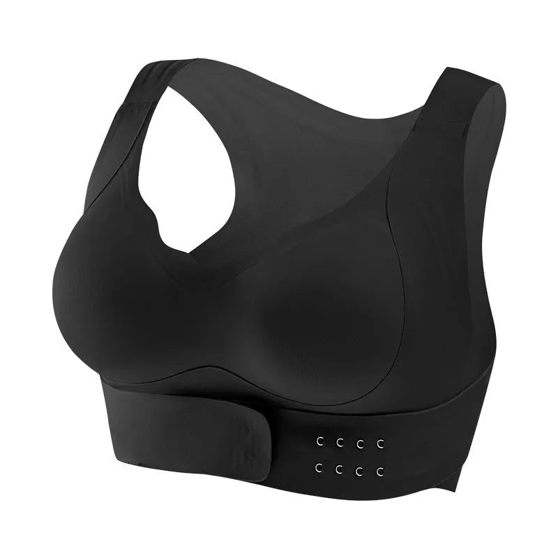 Women's black cross-back sports bra with a front buckle closure and moulded cups.