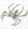 Gold zinc alloy metal spider decorative sticker on a white background
